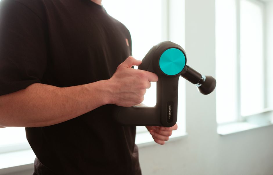 Using a massage gun for muscle recovery
